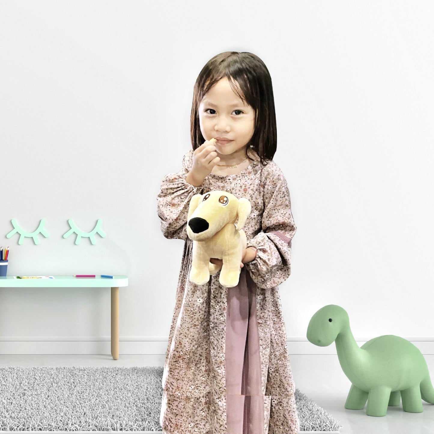 Cute, young girl in a nursery playing with the Singing Borzoi Long Nose Meme Dog plushie/